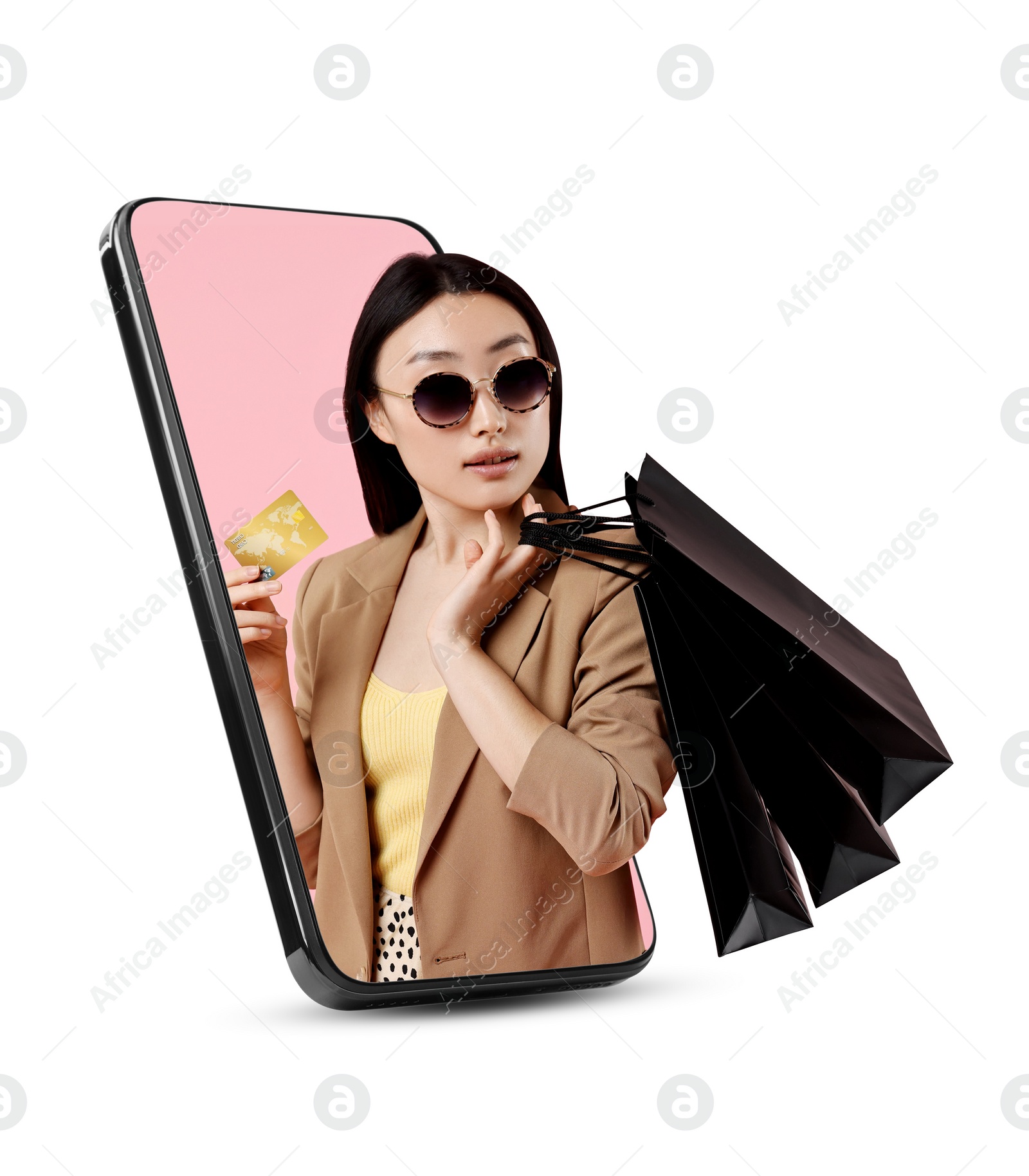 Image of Online shopping. Woman with paper bags and credit card looking out from smartphone on white background
