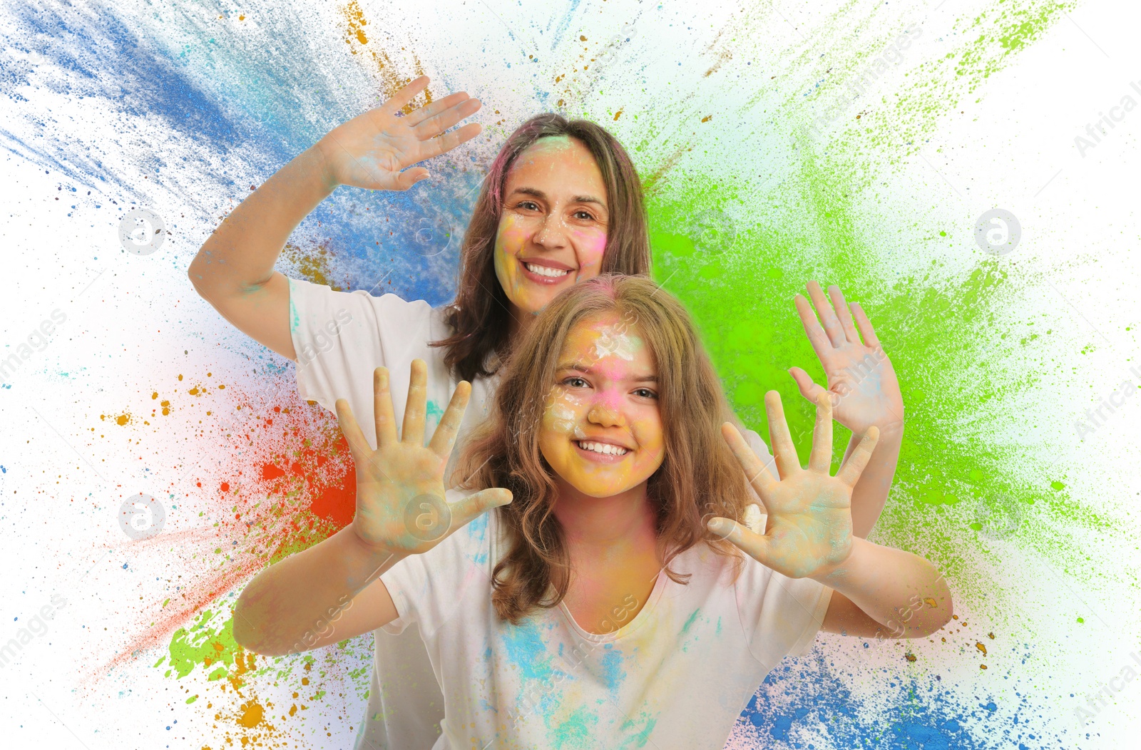 Image of Holi festival celebration. Happy woman and girl covered with colorful powder dyes on white background