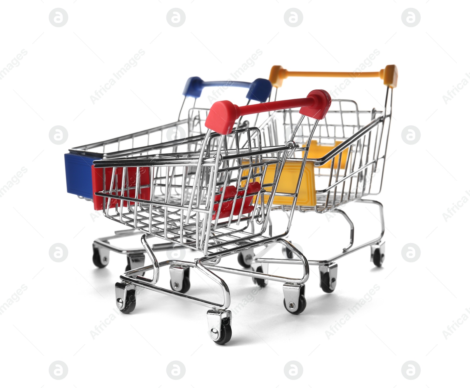 Photo of Empty metal shopping trolleys isolated on white