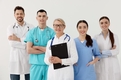 Portrait of medical doctors wearing uniforms indoors