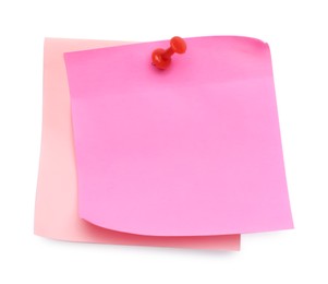 Photo of Blank pink notes pinned on white background, top view