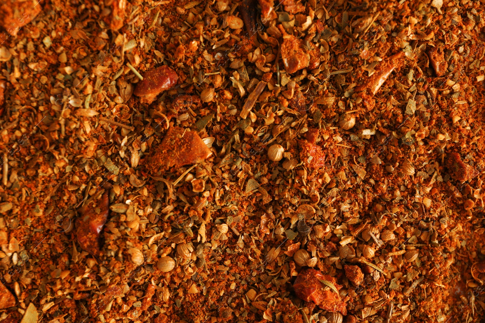 Photo of Many different spices as background, closeup view