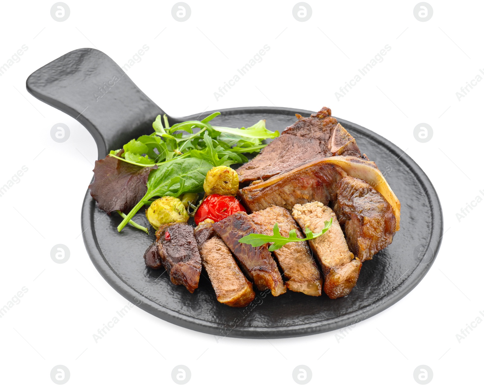 Photo of Delicious grilled beef meat, vegetables and greens isolated on white