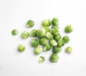 Photo of Fresh Brussels sprouts on white background, top view