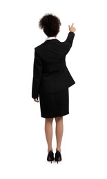 Photo of Businesswoman in suit pointing at something on white background, back view