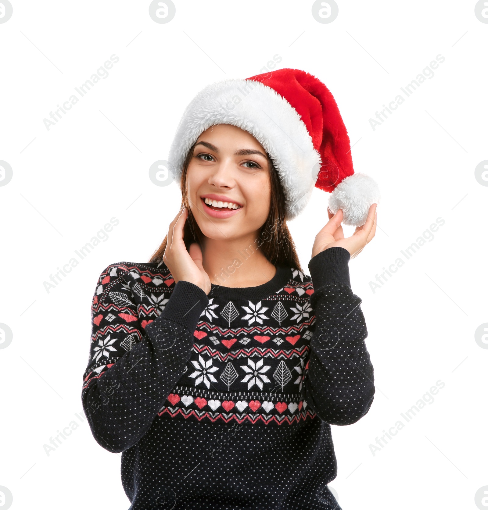 Photo of Young beautiful woman in Santa hat on white background. Christmas celebration