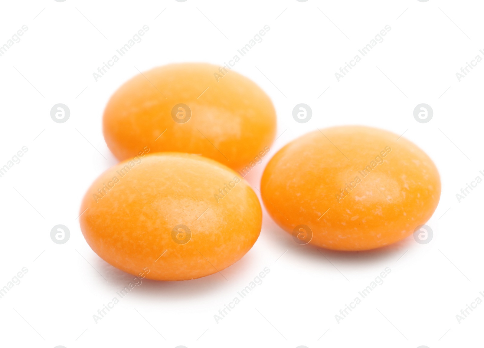 Photo of Pile of color pills on white background