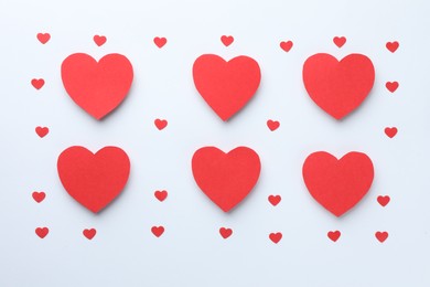 Photo of Paper hearts on white background, flat lay