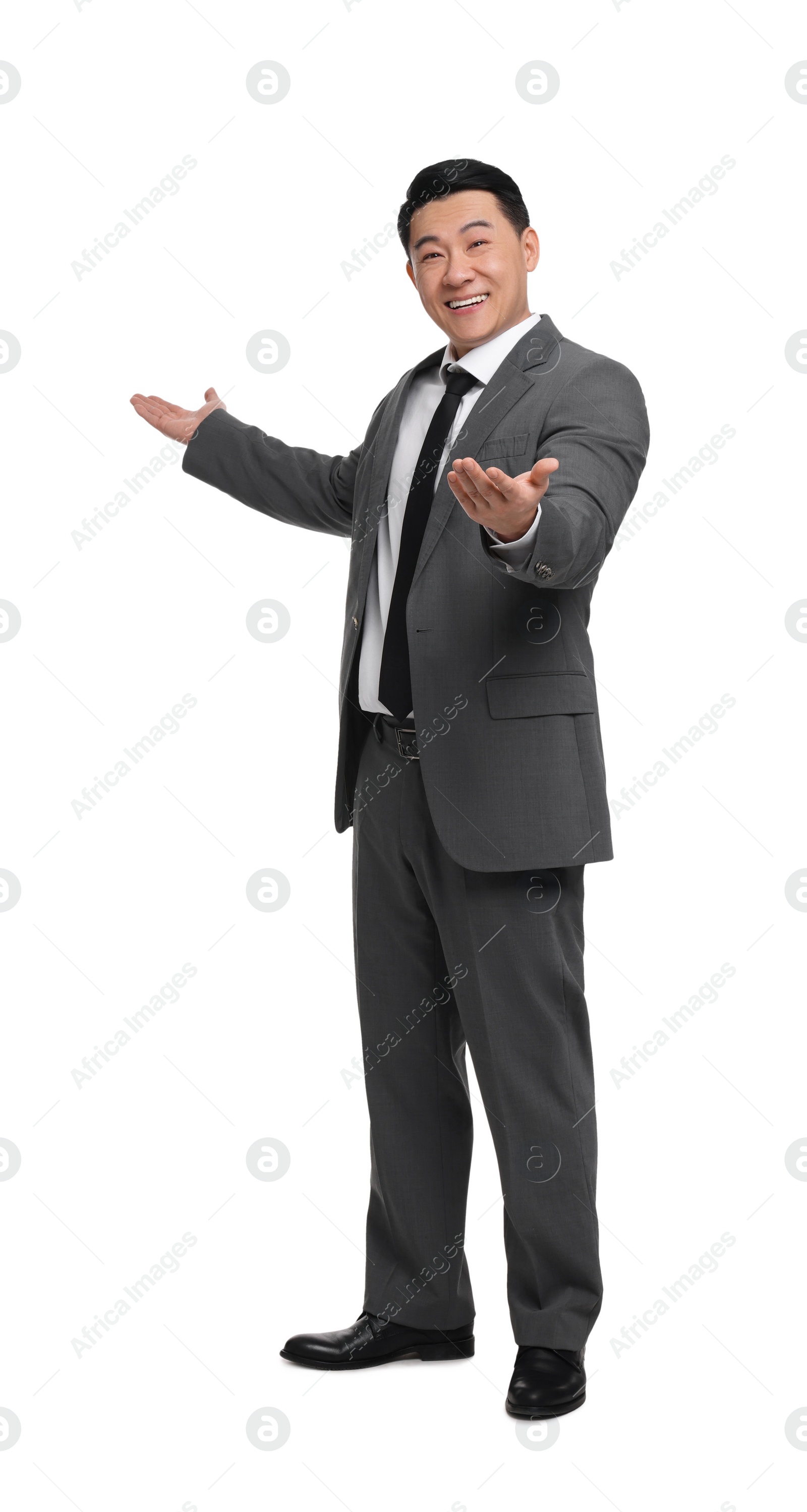 Photo of Businessman in suit posing on white background