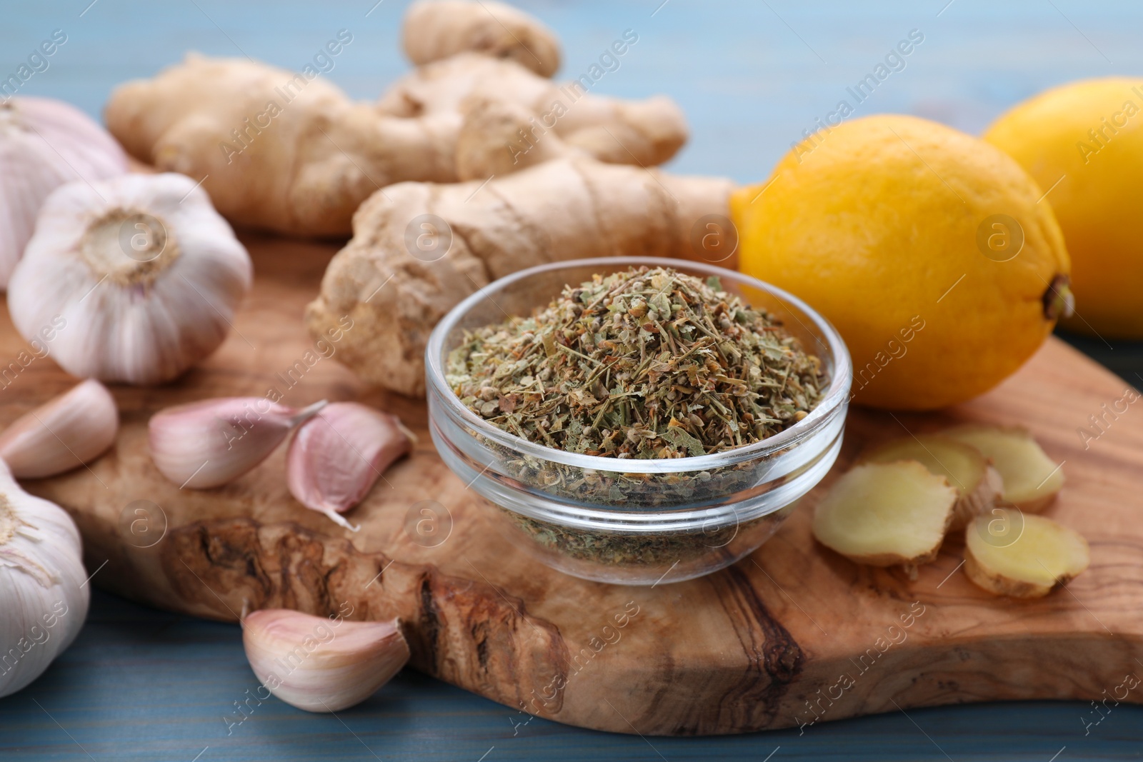 Photo of Cold remedies on wooden board, closeup. Cough treatment