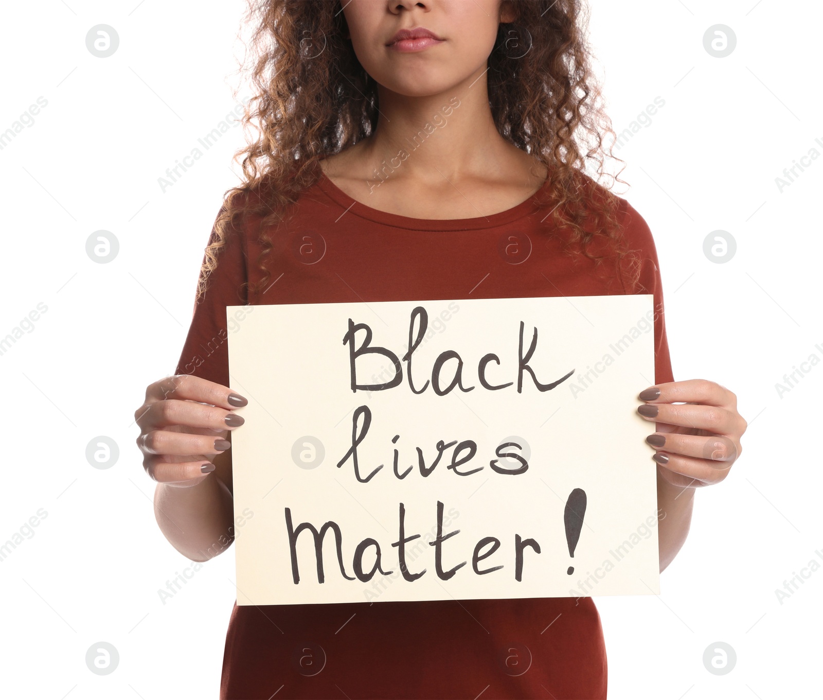 Photo of African American woman holding sign with phrase Black Lives Matter on white background, closeup. Racism concept