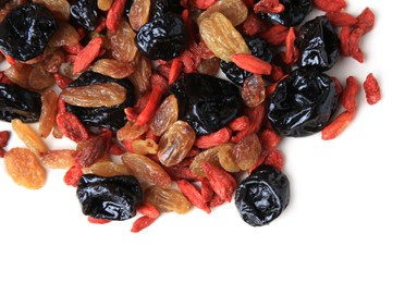 Pile of different tasty dried fruits on white background, top view