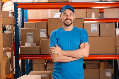 Post office worker near rack with parcels indoors, space for text