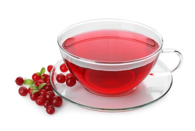 Photo of Cup of delicious cranberry tea and berries isolated on white