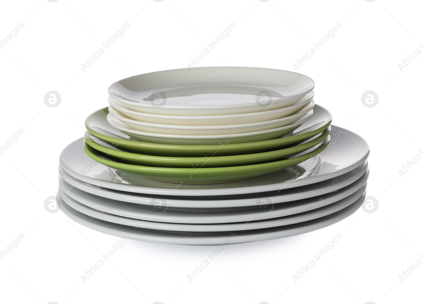 Photo of Stack of beautiful ceramic plates isolated on white