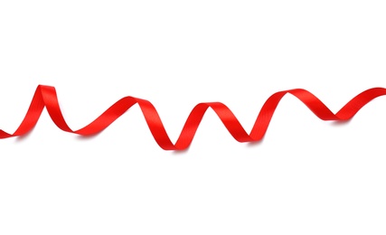 Photo of Simple red ribbon on white background, top view