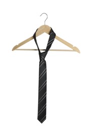 Hanger with striped necktie isolated on white