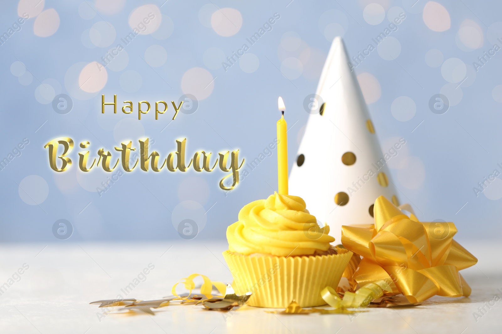 Image of Delicious cupcake with burning candle and text Happy birthday on blurred background