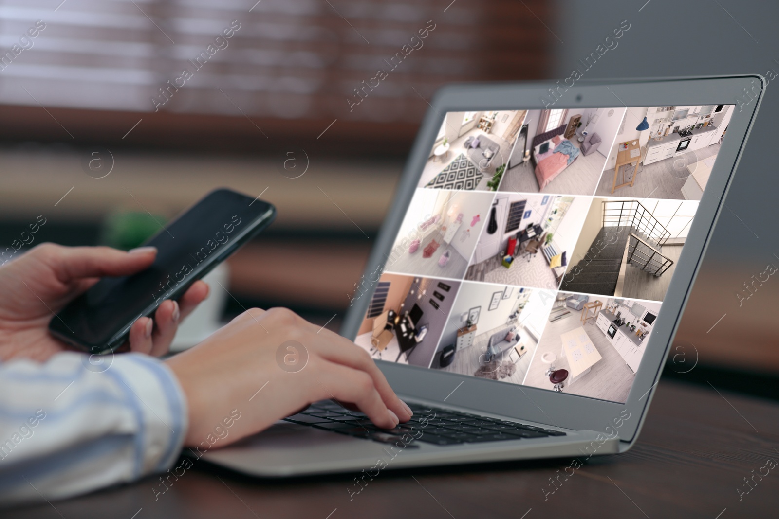 Image of Woman monitoring modern cctv cameras on laptop indoors, closeup. Home security system