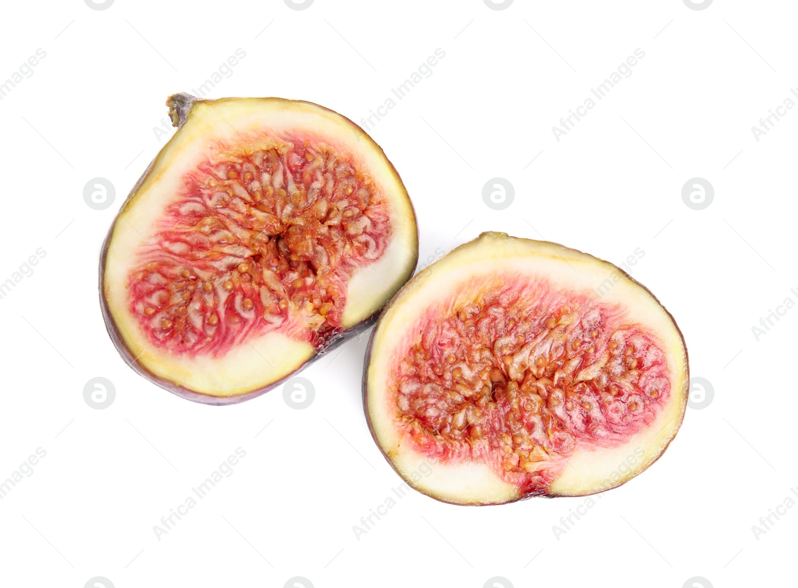 Photo of Pieces of ripe fig isolated on white, top view