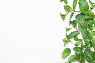 Photo of Fresh green mint leaves on white background, top view