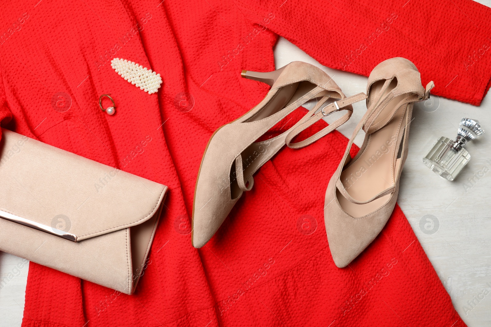 Photo of Flat lay composition with beautiful shoes on light background