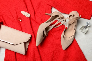 Photo of Flat lay composition with beautiful shoes on light background