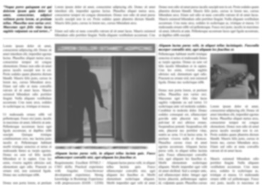 Newspaper with detective article as background, blurred view