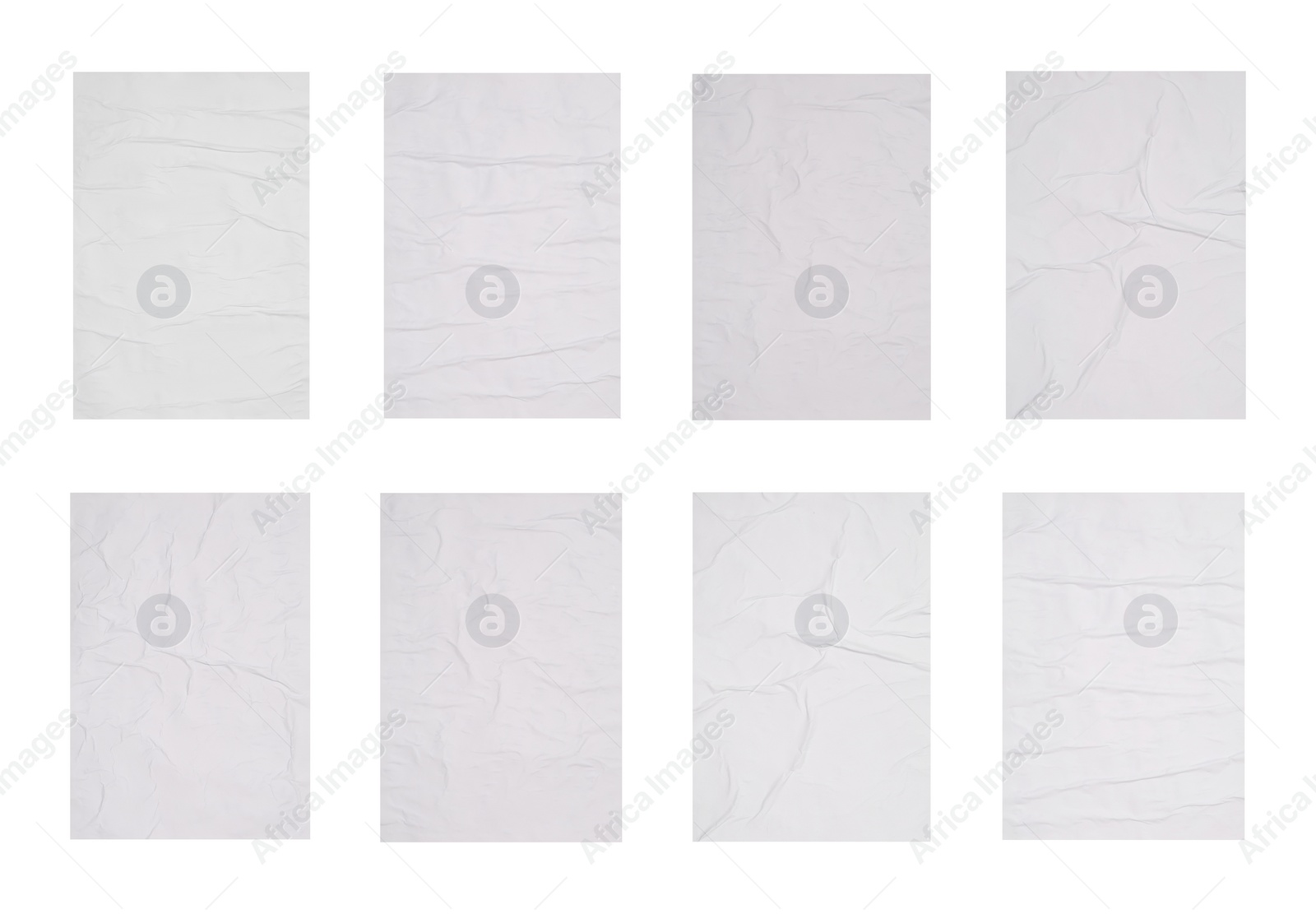 Image of Collection of creased blank posters on white background