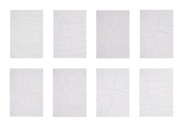 Image of Collection of creased blank posters on white background