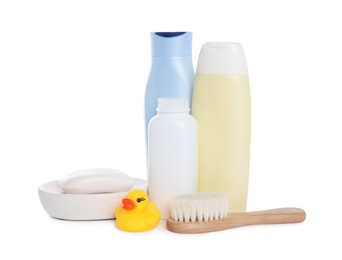 Photo of Baby cosmetic products, bath duck and brush isolated on white