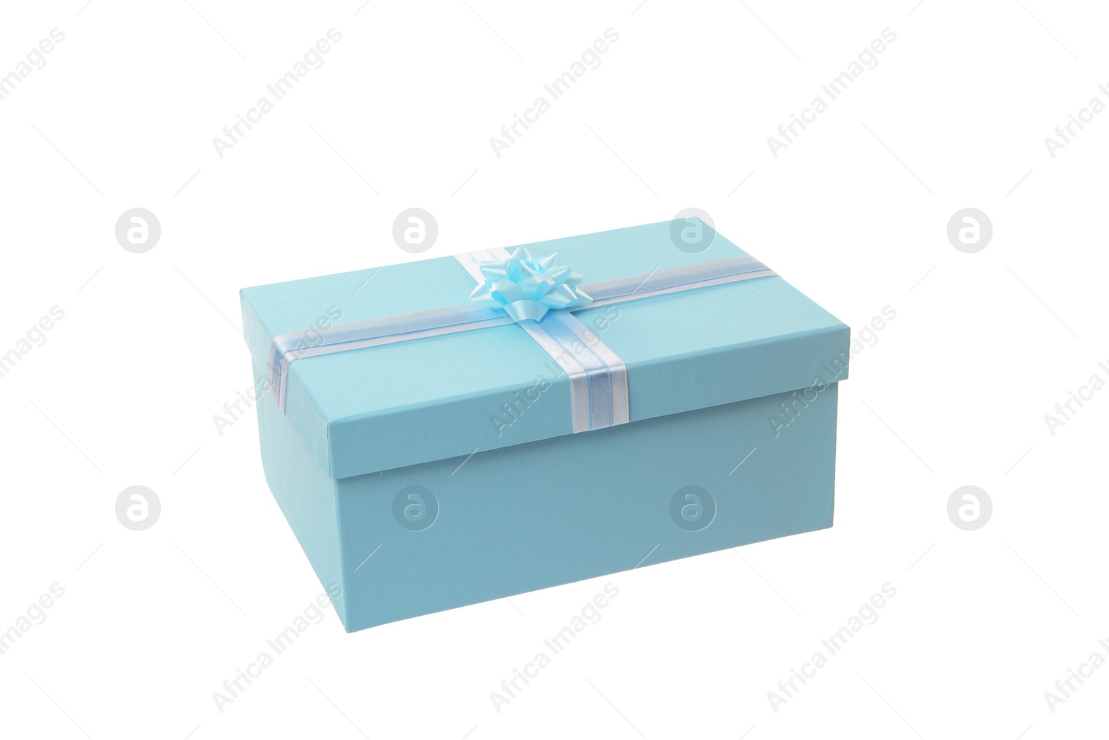 Photo of Light blue gift box with bow isolated on white