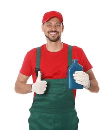 Photo of Man holding blue container and showing thumbs up of motor oil on white background