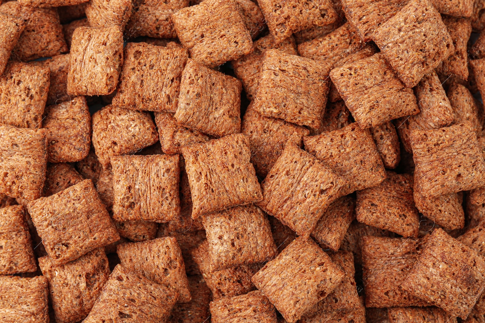 Photo of Sweet crispy chocolate corn pads as background, top view