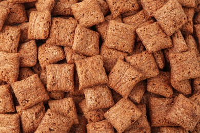 Sweet crispy chocolate corn pads as background, top view