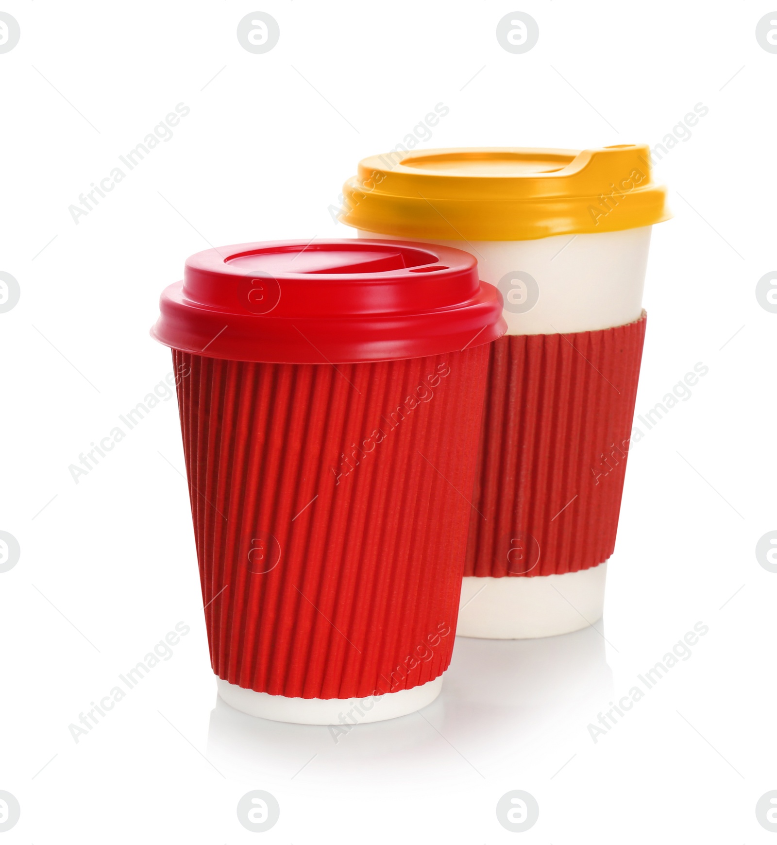 Photo of Takeaway paper coffee cups with lids on white background