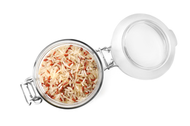Photo of Mix of brown and polished rice in jar isolated on white, top view