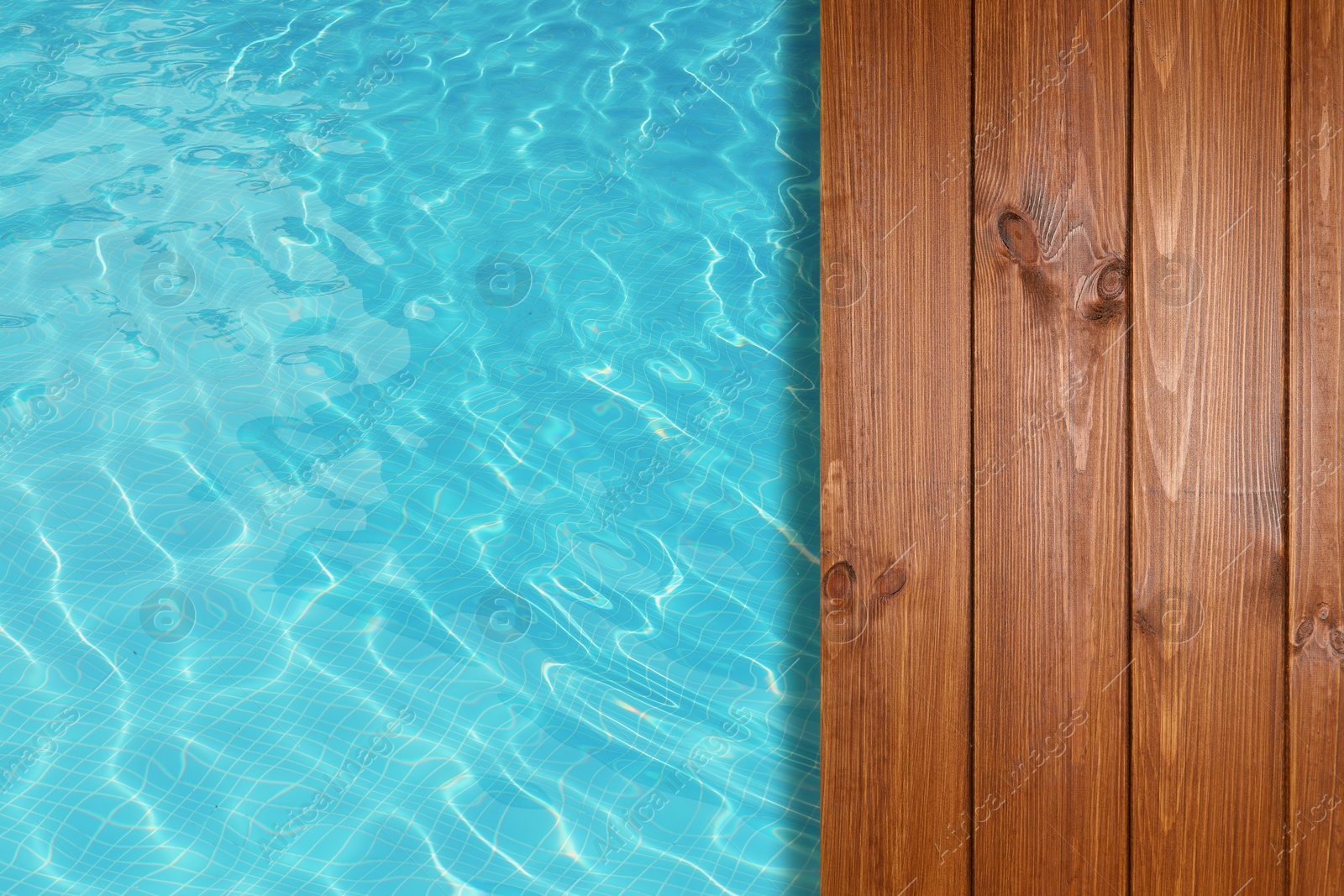 Image of Empty wooden surface near swimming pool with clear water. Space for design