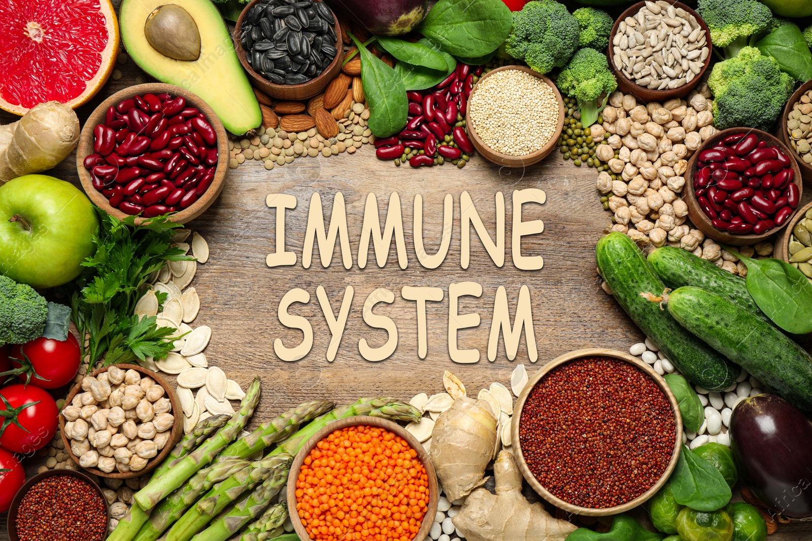 Image of Immune system boosting with proper nutrition. Different foods on wooden table, flat lay