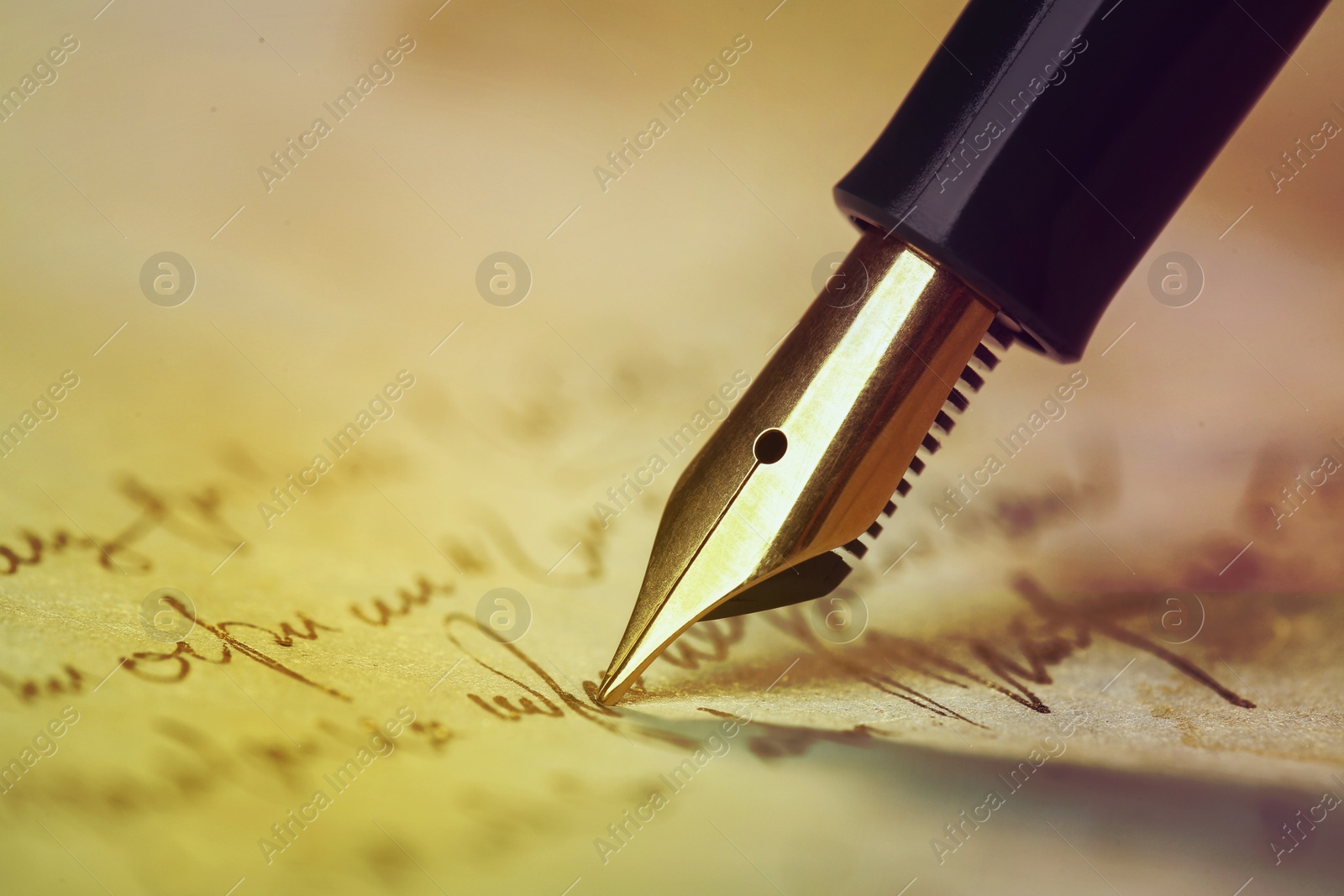 Image of Writing letter with fountain pen, closeup. Space for text