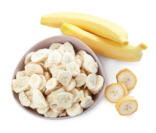 Photo of Sweet sublimated and fresh bananas on white background, top view