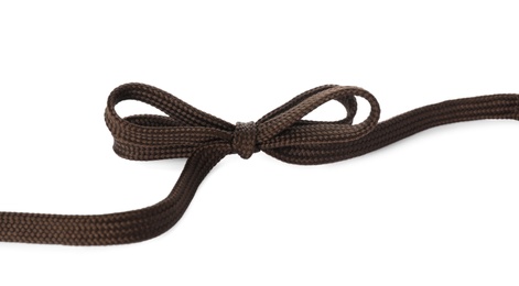 Dark brown shoe lace tied in bow isolated on white