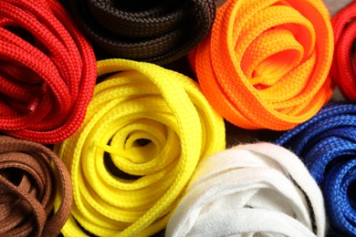 Colorful shoelaces as background, closeup. Stylish accessory