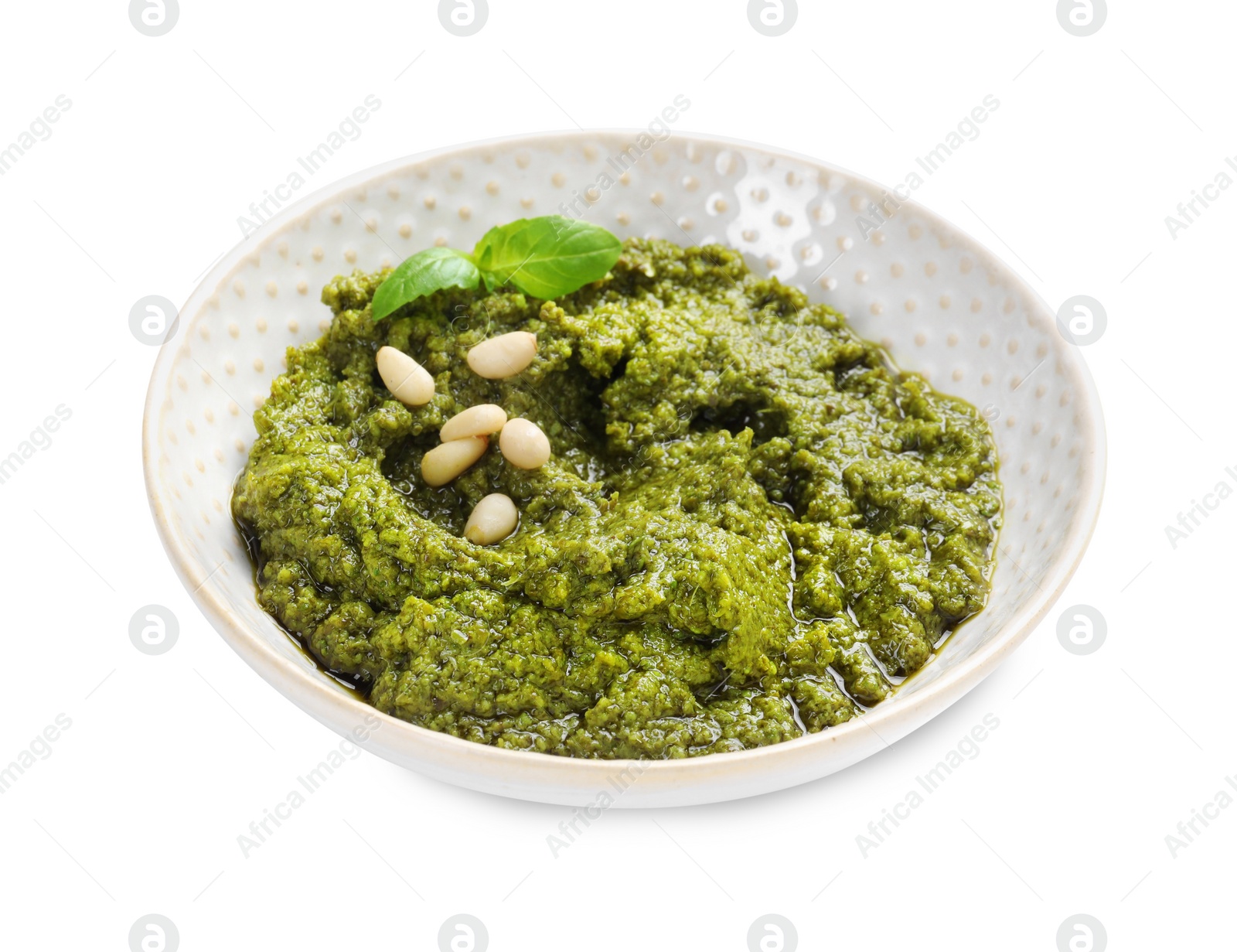 Photo of Fresh tasty pesto sauce isolated on white