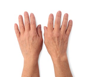 Closeup view of woman's hands with aging skin, top view