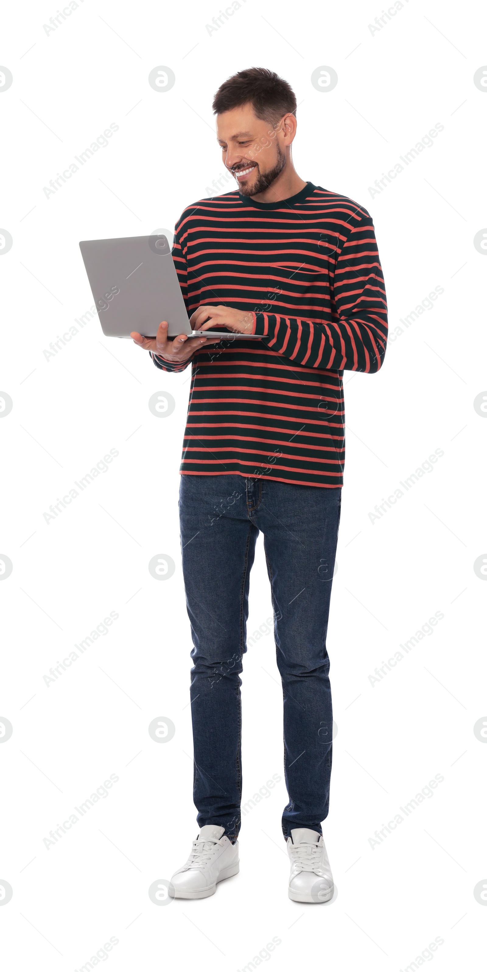 Photo of Smiling man with laptop on white background