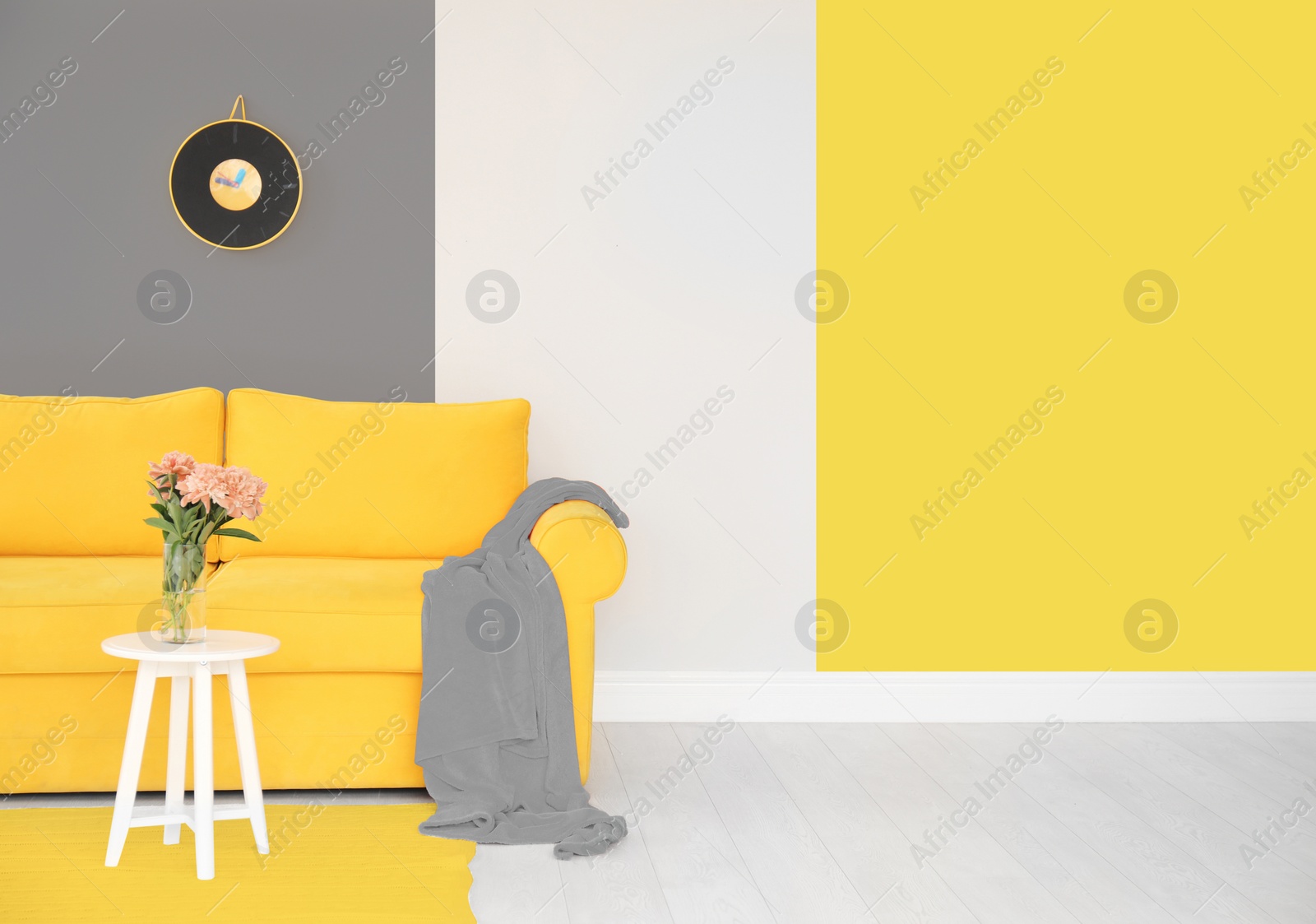 Image of Color of the year 2021.Elegant living room interior with yellow sofa