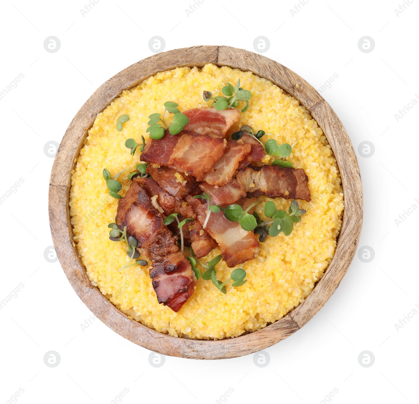 Photo of Cooked cornmeal with bacon and microgreens in bowl isolated on white, top view