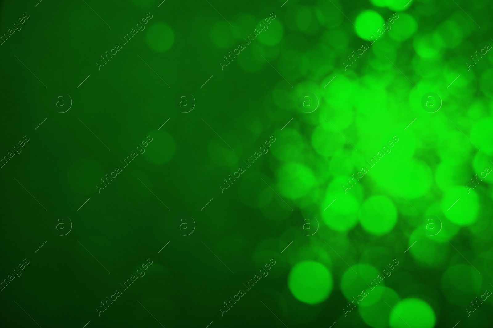 Image of St. Patrick day. Green background with blurred lights, bokeh effect