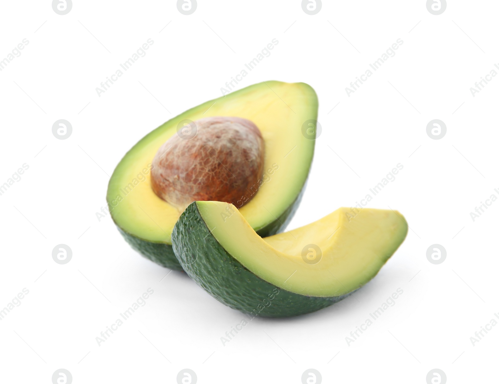 Photo of Slices of ripe avocado on white background